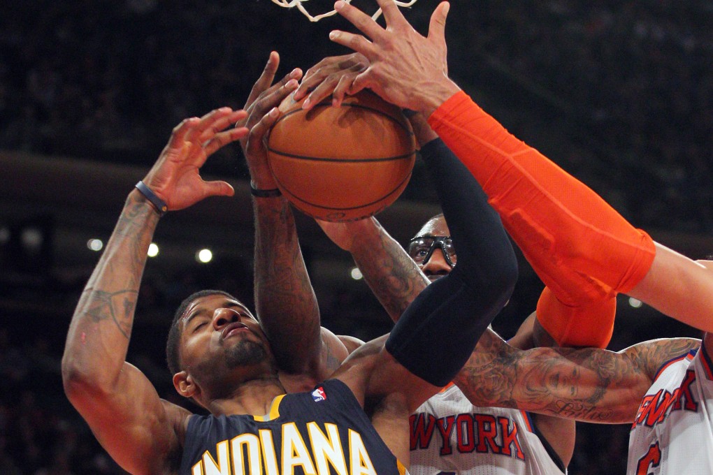Indiana Pacers small forward Paul George and New York Knicks power forward Amare Stoudemire fight for a rebound in their NBA game at Madison Square Garden. The Knicks defeated the Pacers 92-86. Photo: USA TODAY Sports