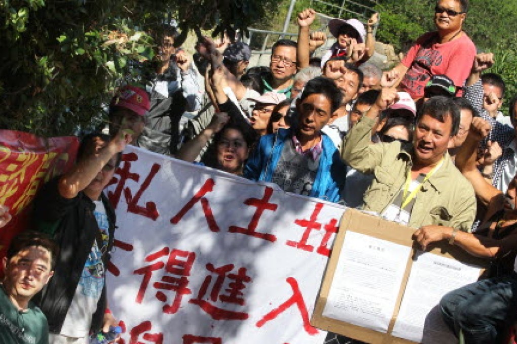 In November, about 100 villagers and their supporters blocked the path of the Oxfam Trailwalker charity walk, forcing hundreds of participants to take another route for the marathon hike. Photo: K. Y. Cheng