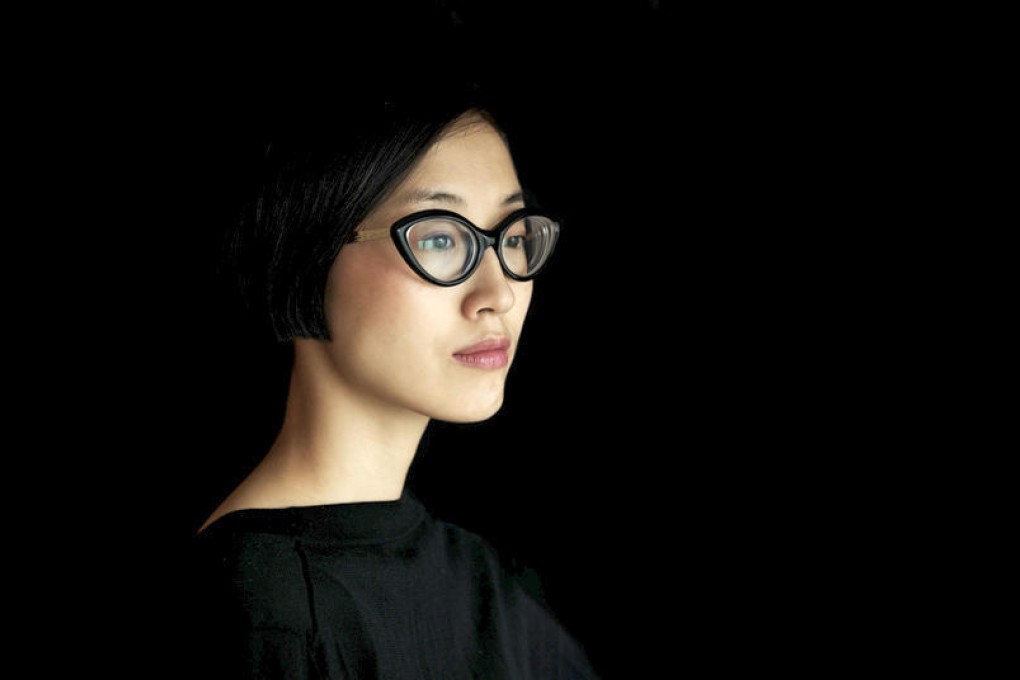 Liu Min describes her clothes as a "yin-yang balance of masculine and feminine".