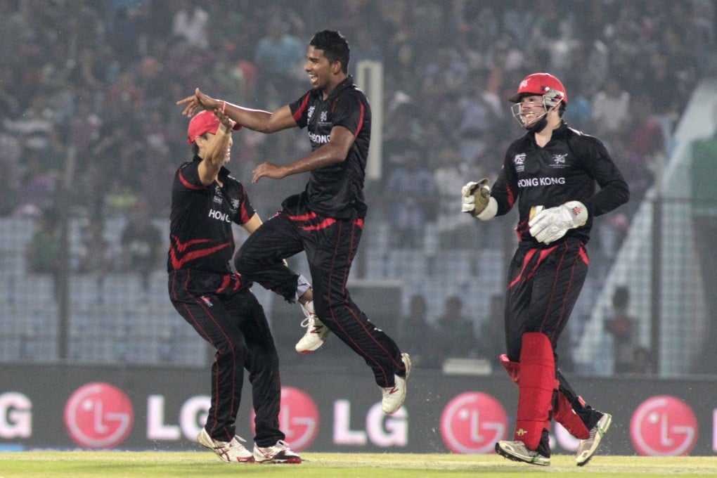 Hong Kong bowler Nadeem Ahmed jumps in air as he celebrates a Bangladeshi wicket during their ICC Twenty20 match in Chittagong. Photo: AP