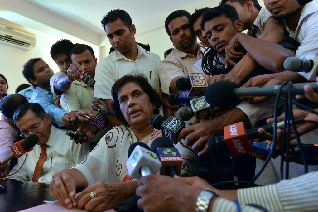 Kumaratunga tells the media of her "harassment". Photo: AFP