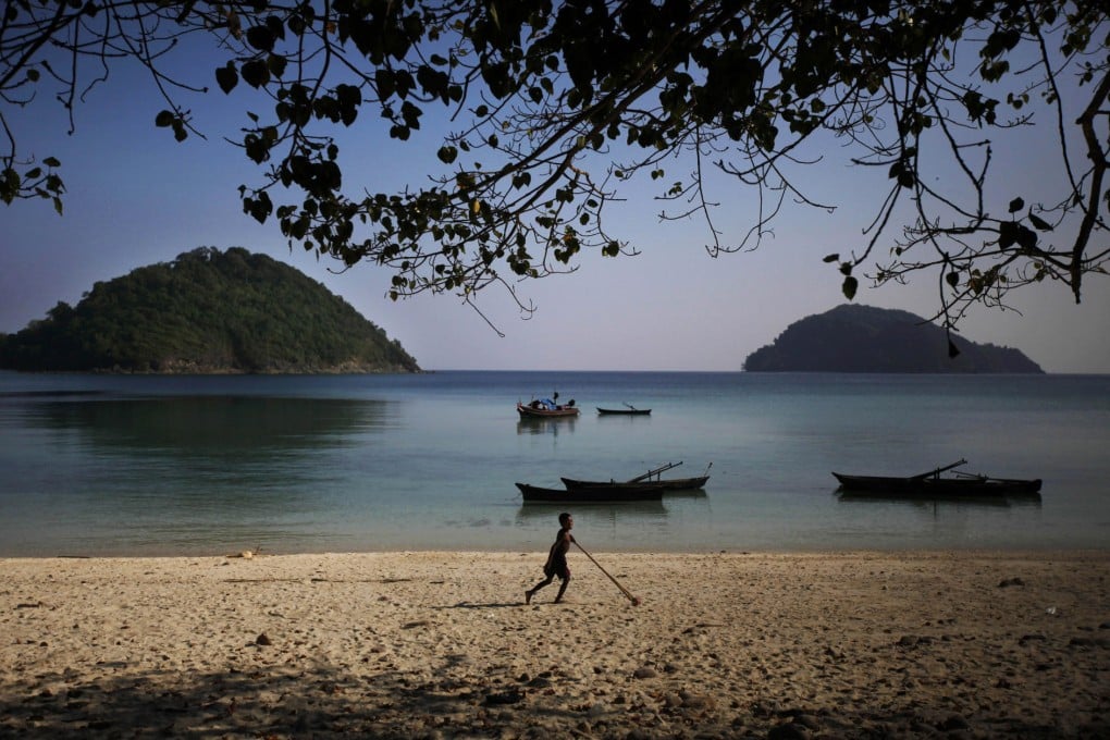 A Moken youngster plays on the beach on Island 115 of the Mergui archipelago, hailed as one of Asia's last tourism frontiers but now facing an invasion by developers eager to cash in on its primeval charm. Photo: AP
