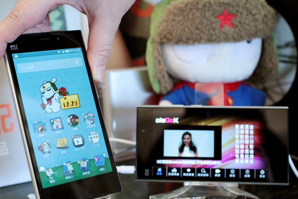 This picture shows a Xiaomi smart phone during a press conference of Three Hong Kong launch of partnership with smartphone maker Xiaomi in Causeway Bay. Photo: Thomas Yao