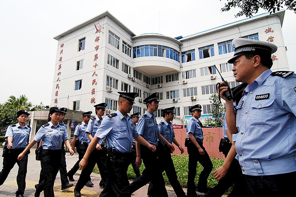 Chengdu civil servants must report to their bosses if they leave the city for work or holidays. Photo: EPA