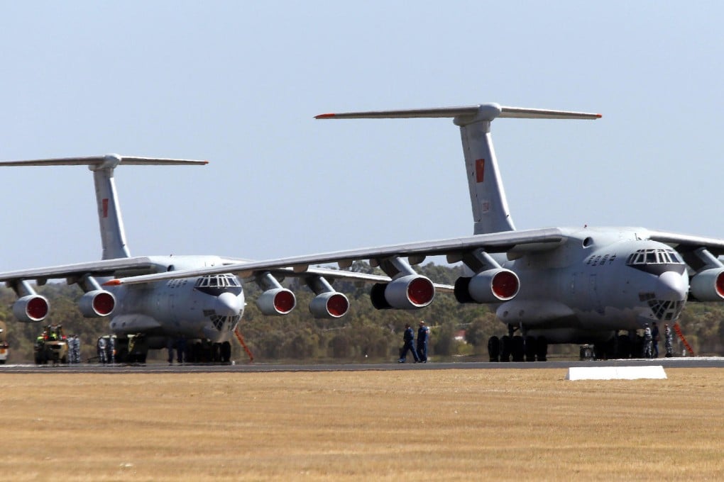 Chinese Air Force Ilyushin aircraft at an Australian air force base near Perth yesterday. They will join the search from today. Photo: Reuters