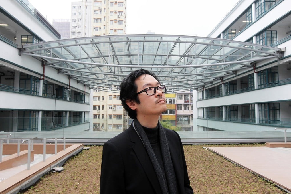 Architect Billy Tam at the revamped PMQ studios in Central. The buildings formerly housed police officers and their families. Photo: May Tse