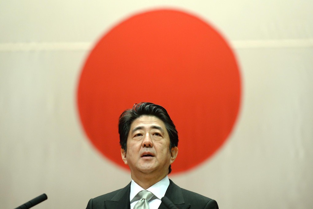 Shinzo Abe's name graces Abenomics but it appears to be Bank of Japan chife Haruhiko Kuroda who does the heavy lifting. Photo: AFP