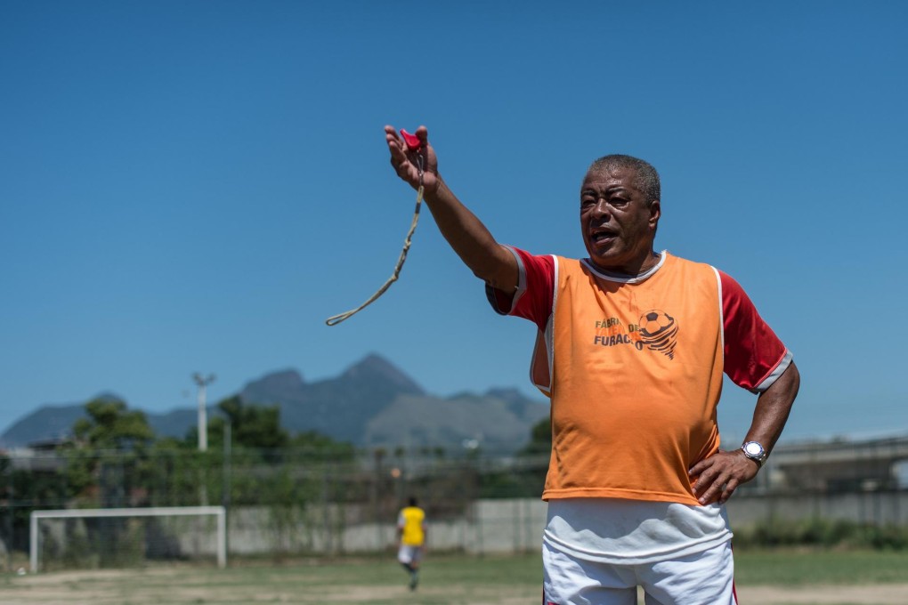 Brazil's 1970 World Cup-winning star Jairzinho tries to unearth new young talent in the Brazilian shanty town of Varginha. Photo: AFP