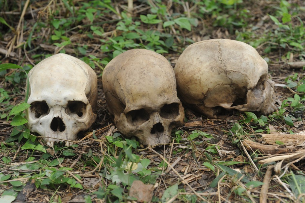 Human skulls lie in the southwestern Nigerian city of Ibadan, on the bush path where rotting bodies and skeletons were discovered in an abandoned building. Photo: AFP