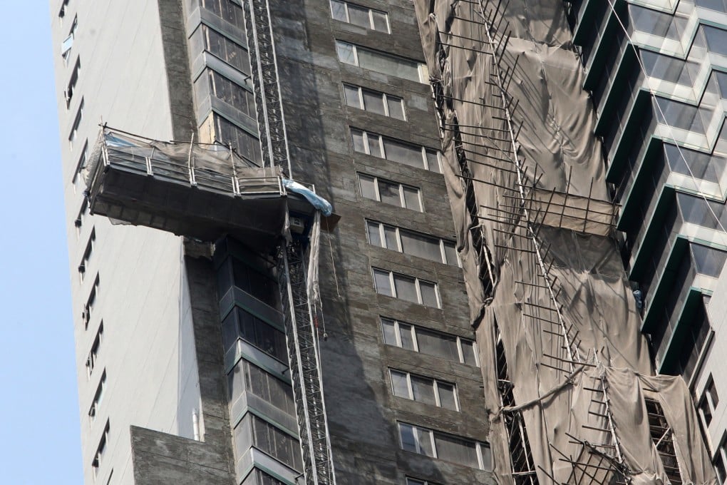Two workmen were killed and two others escaped injury when the gondola they were working on fell apart. Photo: Felix Wong