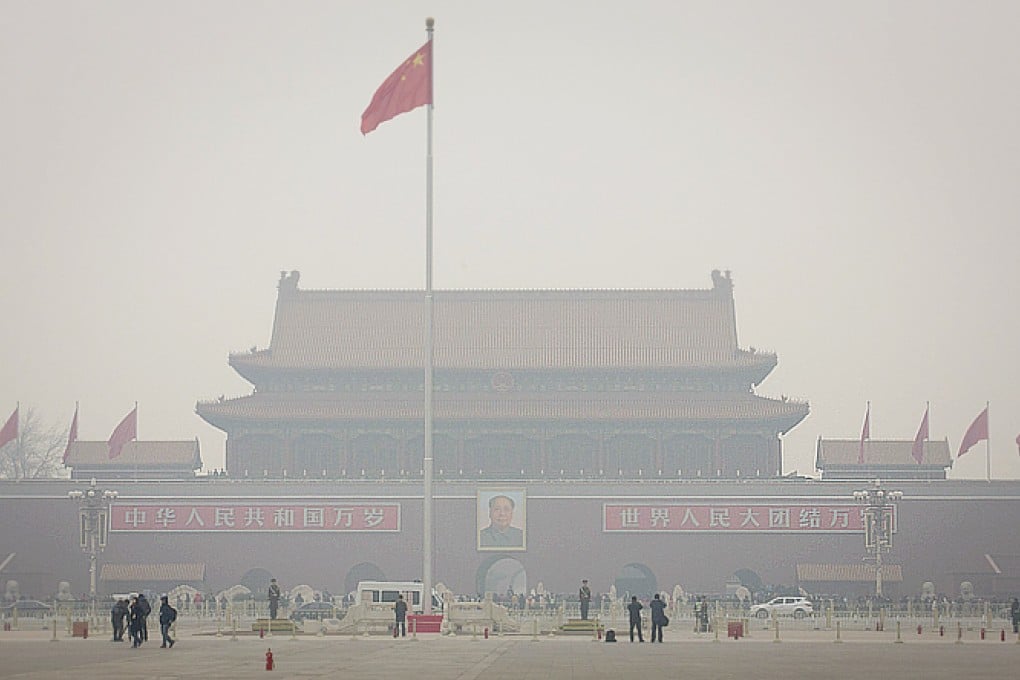 Pollutions hangs over Tiananmen Square earlier this month. The authorities say the lastest round of smog will last until at least Thursday. Photo: EPA