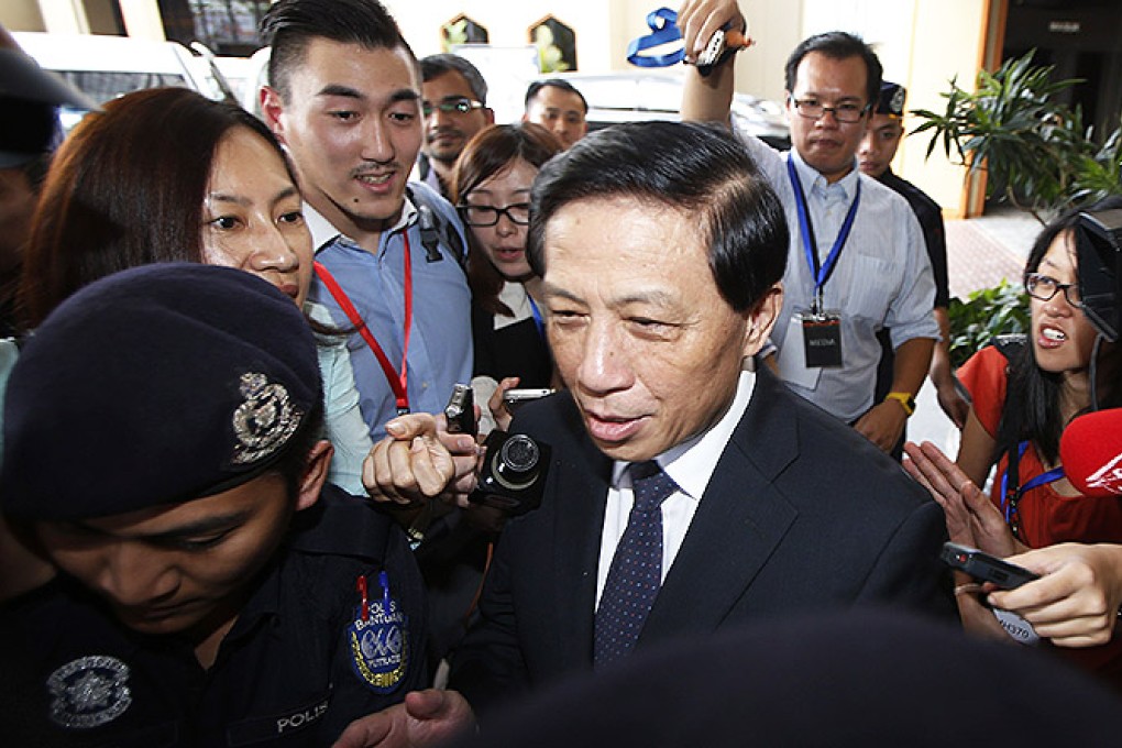 China's special envoy Zhang Yesui leaves after a meeting with Malaysian government officials on missing flight MH370 in Kuala Lumpur. Photo: Reuters