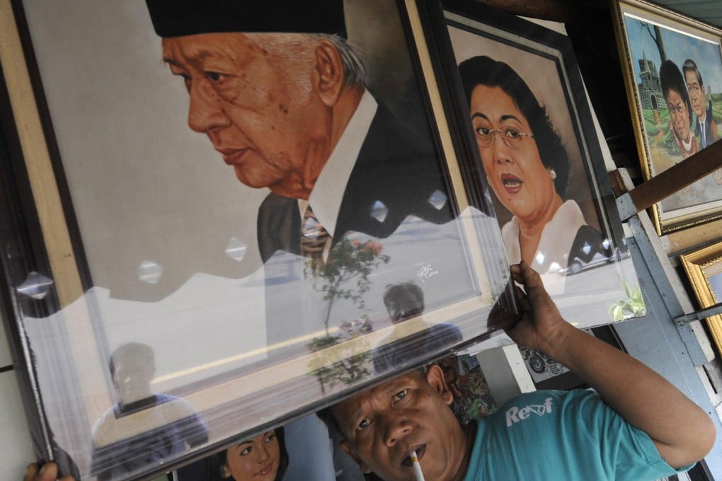 Paintings like this of former dictator Suharto show growing support for the former president ahead of elections this year. Photo: AFP