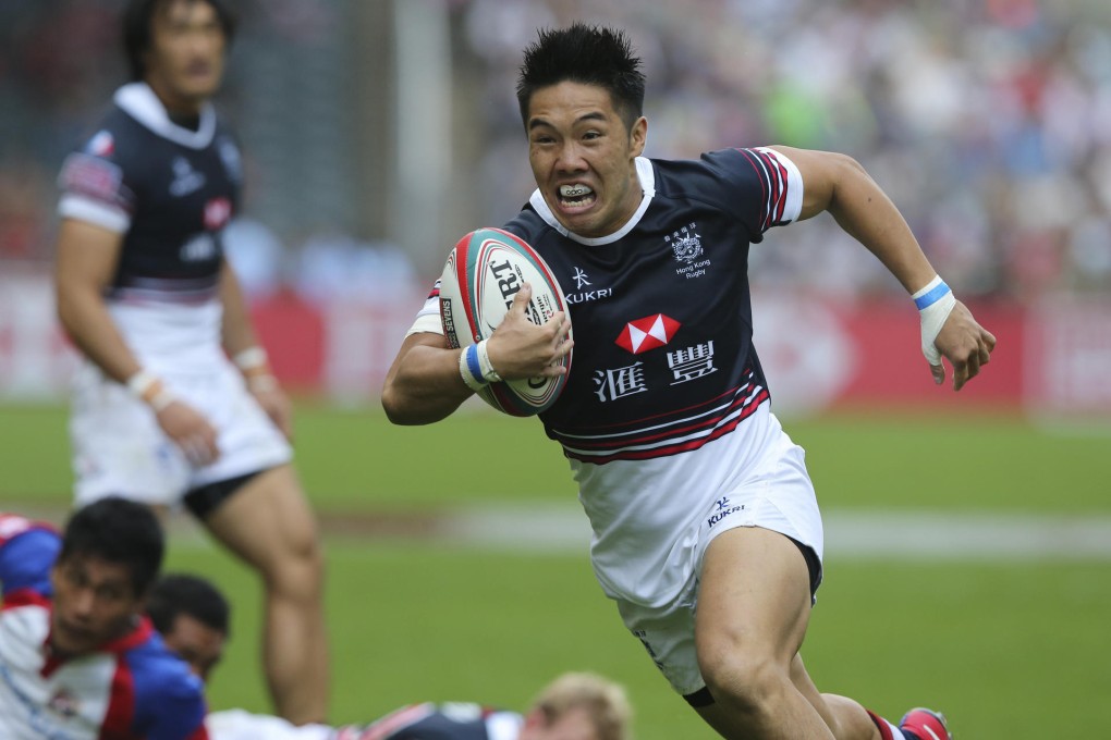 Hong Kong's Tsang Hing-hung makes a break for the try line against American Samoa on the first day of the Sevens at Hong Kong Stadium. Photo: KY Cheng