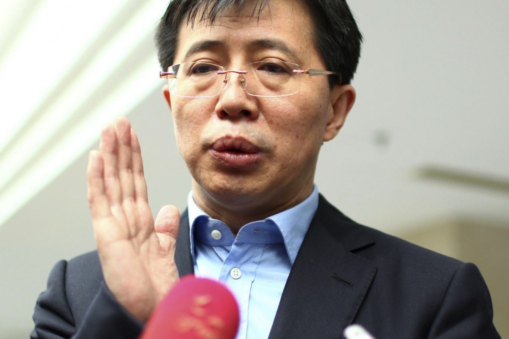 Ji Wenlin, then mayor of Haikou city, speaks to journalists during a session of Hainan Provincial People's Congress in Haikou, on February 10, 2012. Photo: Reuters