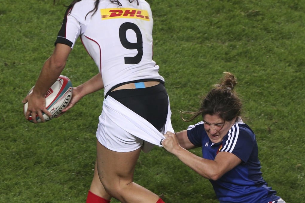 Canada's Bianca Farella (left) exposes more than she bargained for in the women's Sevens Cup final against France. Photo: Felix Wong