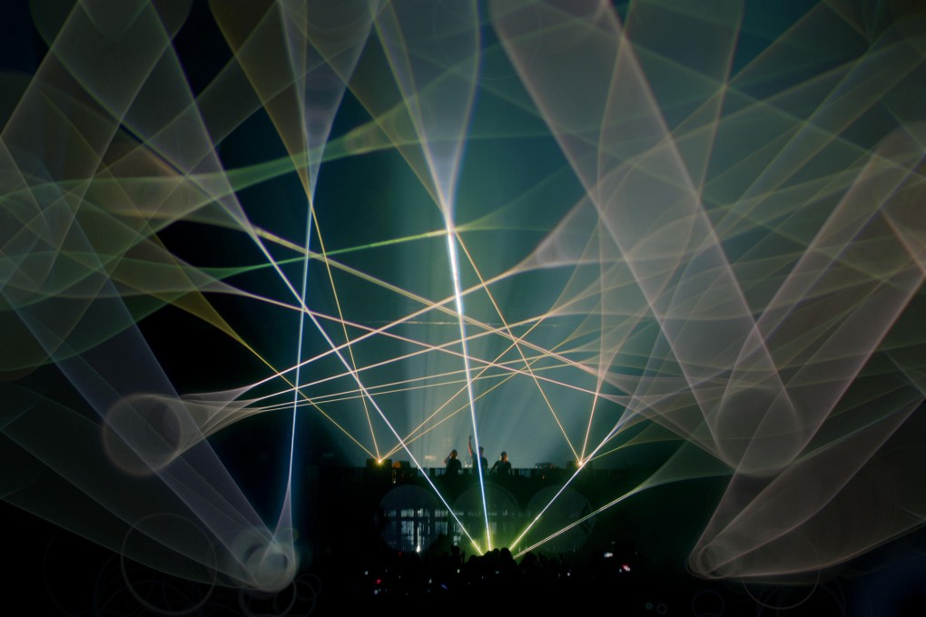 Swedish House Mafia performing at the Rogers Centre in Toronto, Canada, last month during their "One Last Tour" that's captured in Leave the World Behind. Photo: Corbis