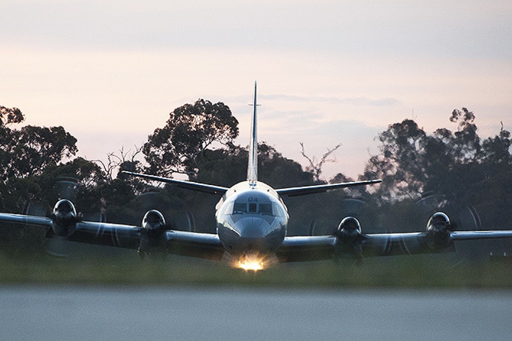 A Royal New Zealand Air Force P3 Orion search plan returns to Perth on Friday night. Photo: Xinhua