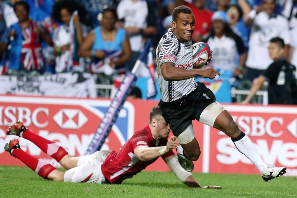 Osea Kolinisau runs in one of his three tries for Fiji in the 2013 Hong Kong Sevens Cup final against Wales. Photo: Sam Tsang/SCMP