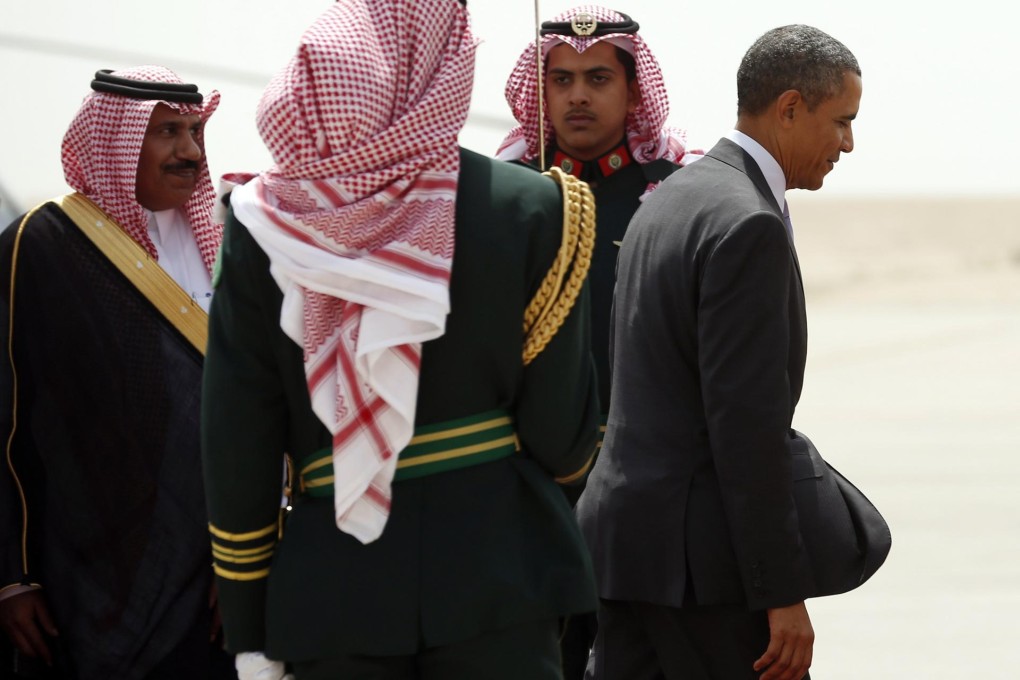 US President Barack Obama boards Air Force One as he departs Saudi Arabia to return to Washington yesterday. Photo: Reuters