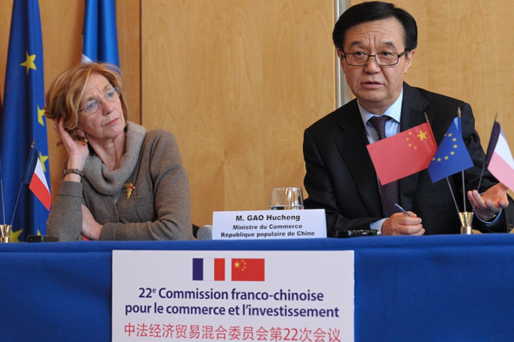 French Trade Minister Nicole Bricq (left) with China's Trade Minister Gao Hucheng during the 22nd Franco-Chinese commission for Trade and Investment on February 24 in Paris. Photo: AFP