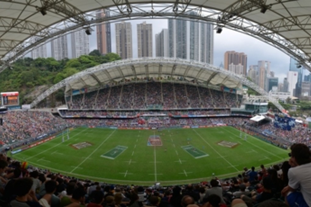 A panorama of a packed Hong Kong Stadium on the final day of the 2014 Cathay Pacific/HSBC Hong Kong Sevens on Sunday. Photo: Antony Dickson