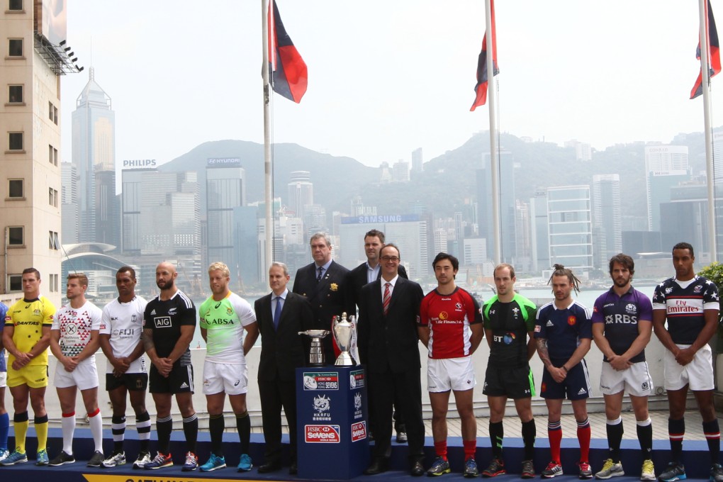 HKRFU chairman Trevor Gregory (centre) at the 2014 Sevens launch press conference with players and coaches. Photo: Jonathan Wong