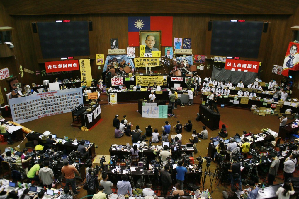 Student protesters, shown here on Friday, have occupied Taiwan's legislative chamber since they stormed it on March 18. Photo: AP
