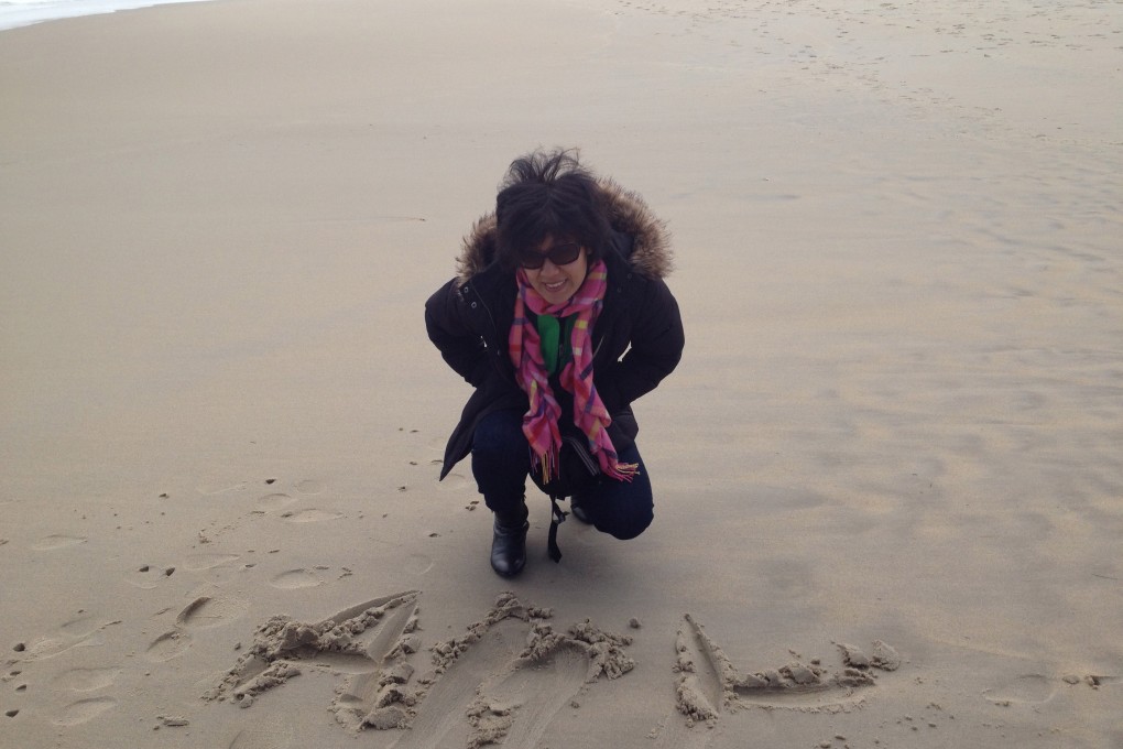 Amy finding happiness near the ocean