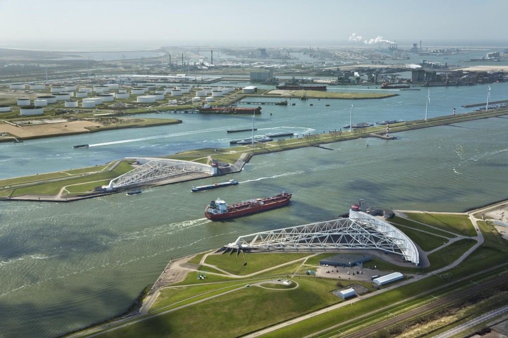 The Maeslantkering, a storm-surge barrier that closes when needed, was built to prevent flooding of the Rotterdam harbour. Photos: Corbis; AFP