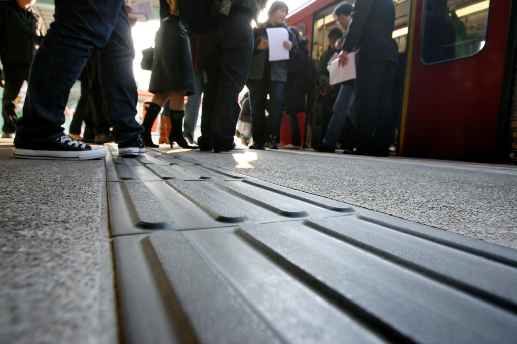 The convenience of buses and the MTR and their provision of braille, tactile surfaces and spoken destination announcements make getting around a straightforward matter for the visually impaired. Photo: SCMP
