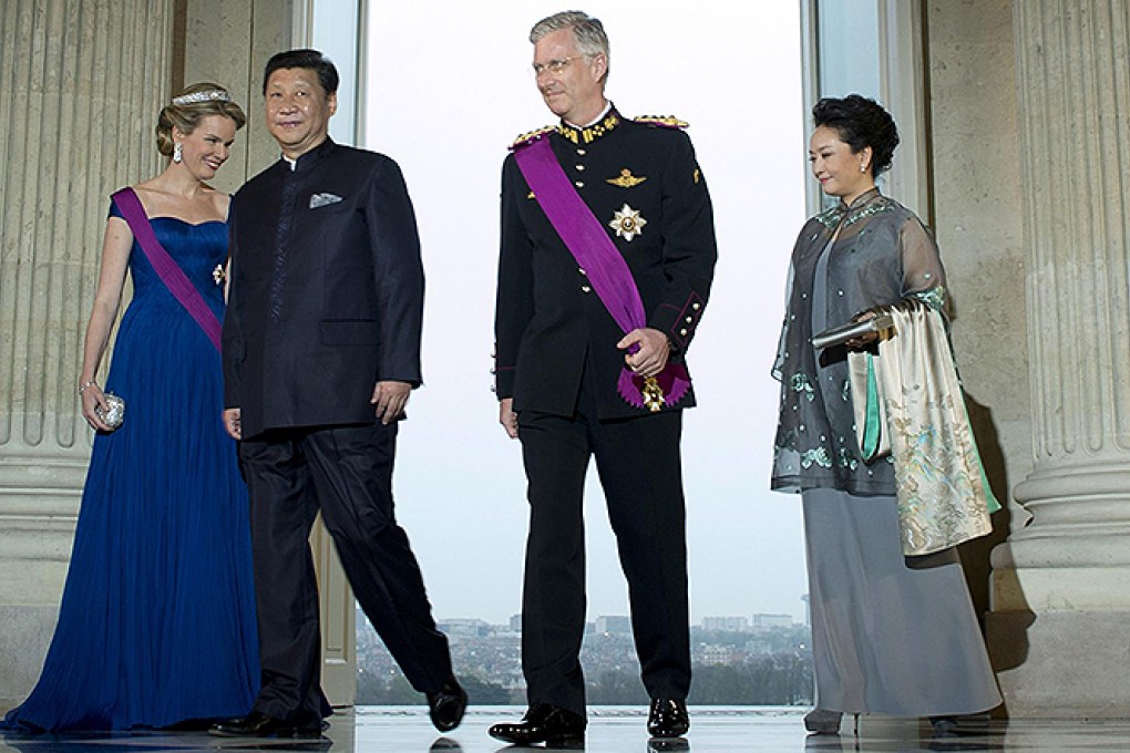 Xi Jinping and wife, Peng Liyuan, attend a state dinner with Belgium's King Philippe. Photo: AFP