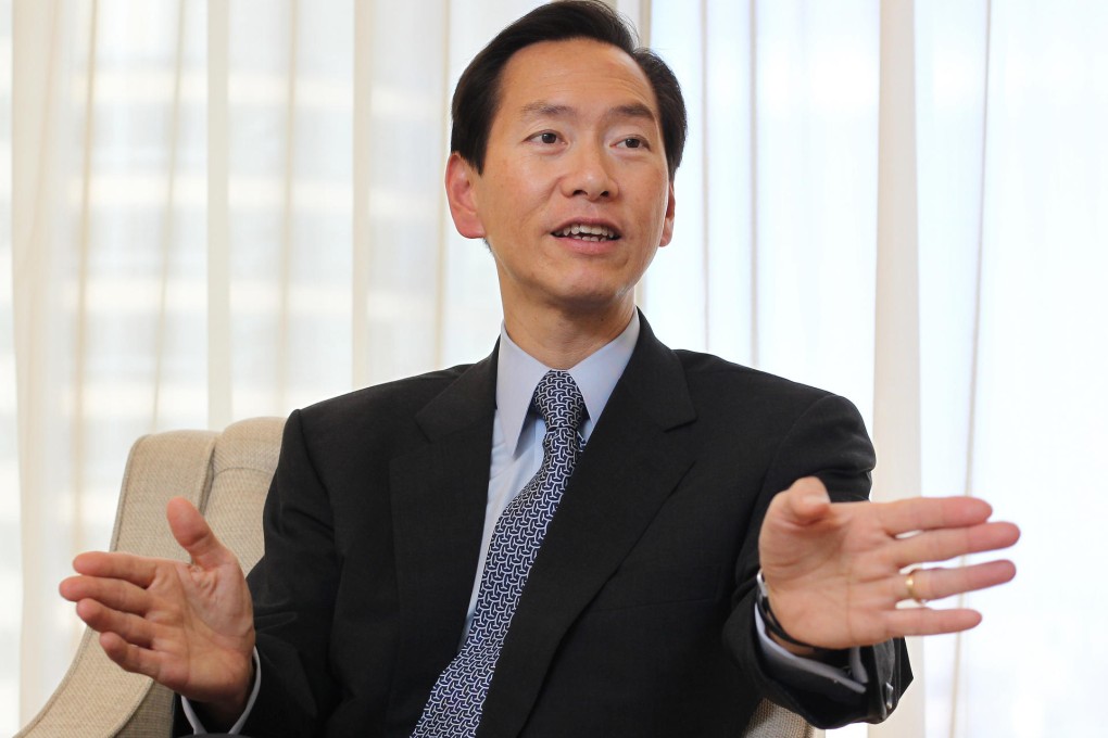 Bernard Chan was back at work yesterday, two days after undergoing an operation to prevent a heart attack. Photo: Dickson Lee