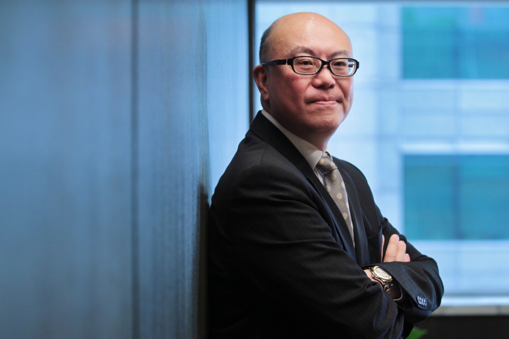 Donald Choi remains cautious on bidding for land. Photo: Thomas Yau