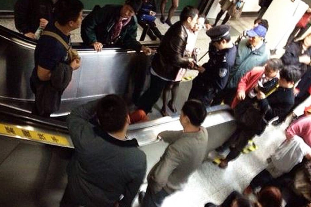 The escalator suddenly started to run in reverse, reports said. Photo: Screengrab