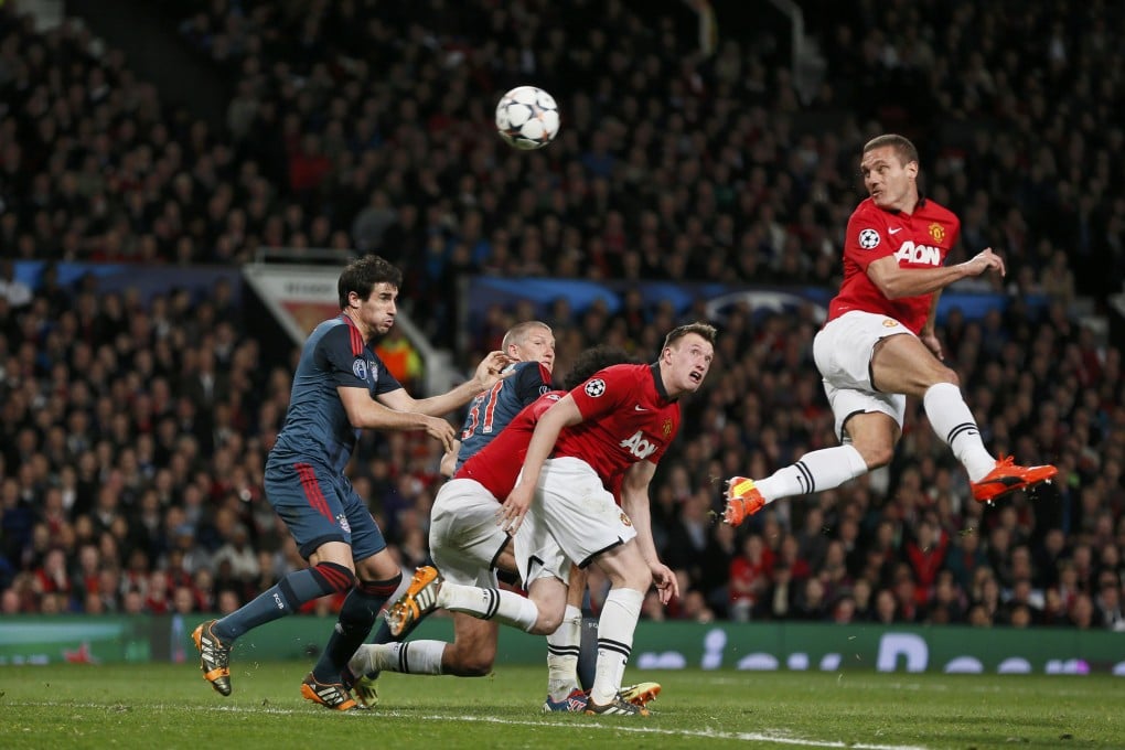 Nemanja Vidic opens the scoring for Manchester United. Photo: Reuters