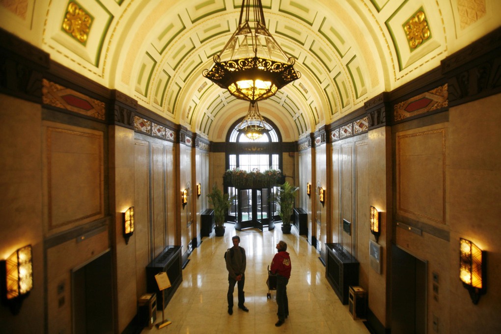 The lobby of Peace Hotel, owned by Jin Jiang International, which once considered listing through its Hong Kong unit. Photo: Bloomberg