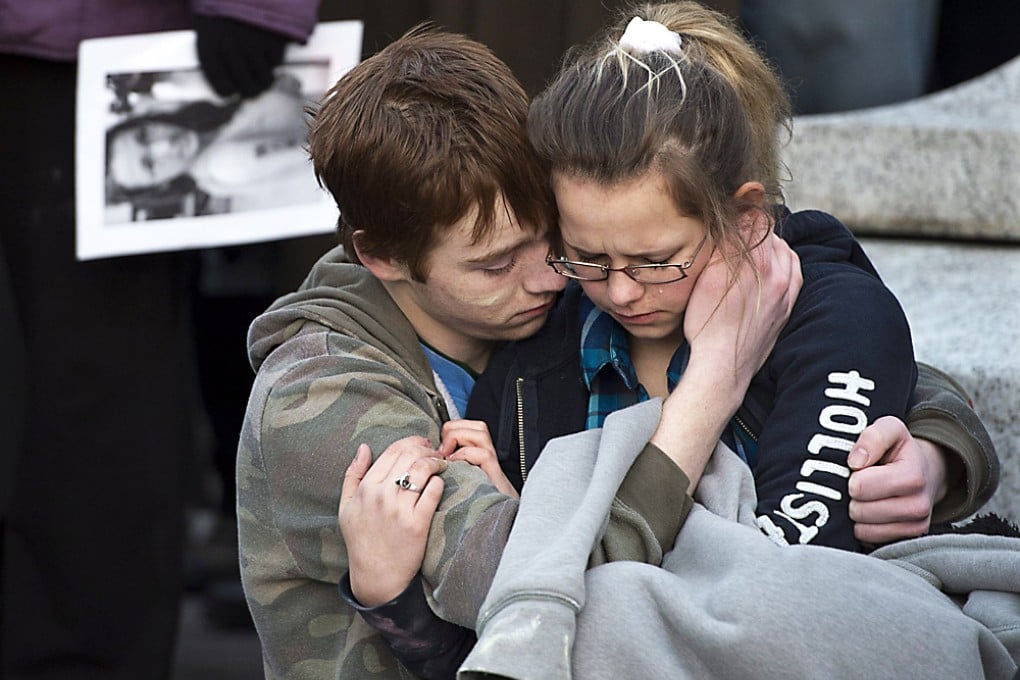 School friends attend a vigil for teenager Rehtaeh Parsons, who committed suicide after months of school bullying in Halifax, Canada. Photo: AP