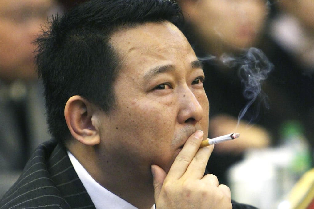 Liu Han, former chairman of Hanlong Mining, denies leading a 36-member gang on a crime spree of murder and gun-running over the past two decades. Photo: Reuters