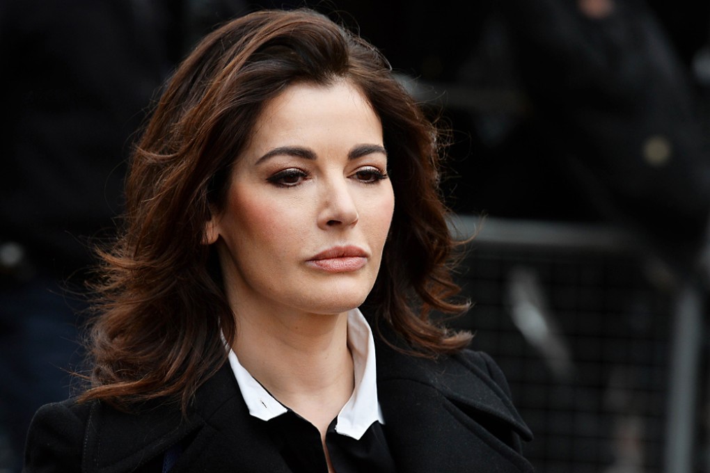 British television chef Nigella Lawson arrives at Isleworth Crown Court in west London. Photo: AFP