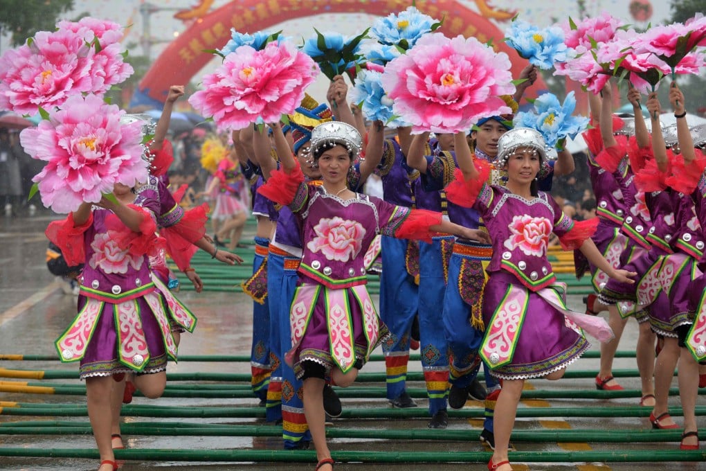 Dancers from the Zhuang ethnic group perform at the San Yue San festival in Wuming county, Guangxi Zhuang Autonomous Region, on Wednesday.  Photo: Xinhua