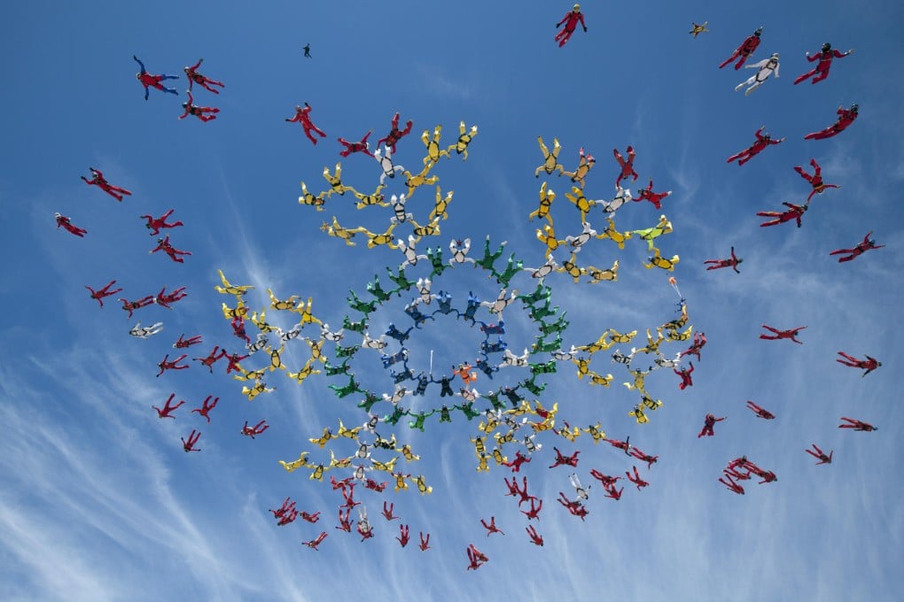 Members of the World Team are shown rehearsing their jump above Eloy, in Arizona, the day before one skydiver was killed. Photo: AP