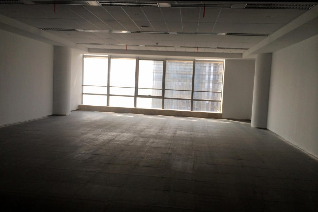 Officials say high office vacancy rates are only "temporary" and time is needed for fresh capital to digest the supply. Photo: Sandy Li