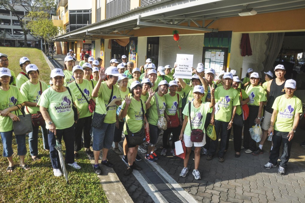Helping seniors interact with the community during the Project Engage Active Ageing Carnival in Singapore on February 16.