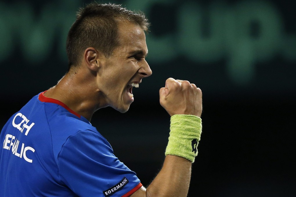 Lukas Rosol of the Czech Republic celebrates a point against Taro Daniel of Japan in their Davis Cup singles match. Photo: EPA