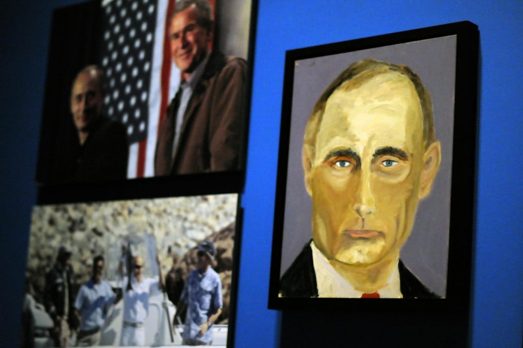 George W. Bush's portraits of two dozen leaders including Vladimir Putin, above, are on display in a Dallas museum. Photo: AP Photo