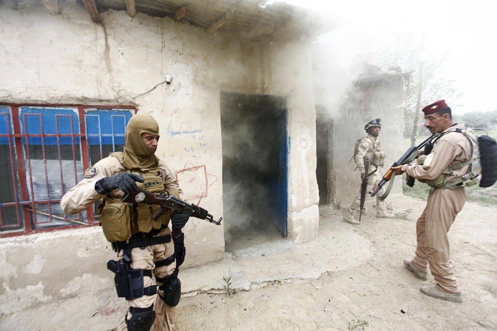 Iraqi security forces clash with Islamic State of Iraq and the Levant fighters south of Baghdad this month. The jihadists are edging closer to the nation's capital. Photo: Reuters
