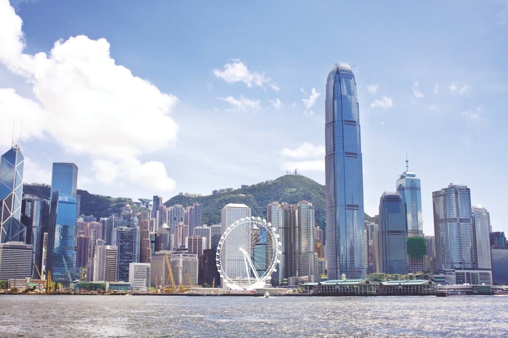 An artist's impression of how the proposed Ferris wheel would look against the backdrop of Central's tower blocks.