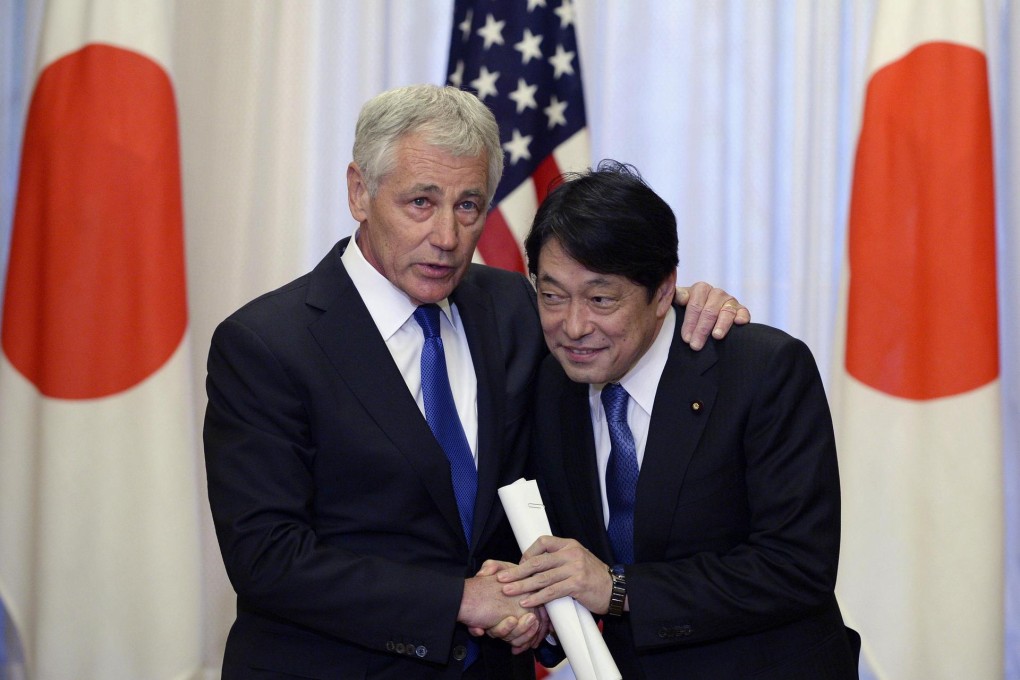 Chuck Hagel and Defence Minister Itsunori Onodera. Photo: Reuters