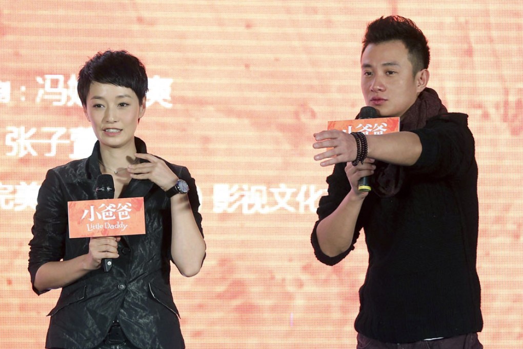 Wen Zhang (right) and his wife Ma Yili